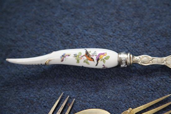 Three pairs of Meissen porcelain handled knives and forks, 19th century, 21cm and 21.5cm